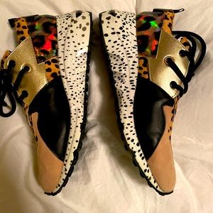 BARELY WORN. Steve Madden Sneaker. Leopard print and multi textile.